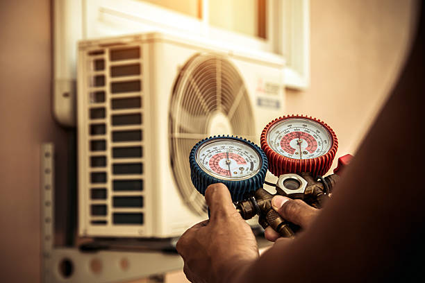 Professional Air Conditioning Service technician working in Shelby, AL
